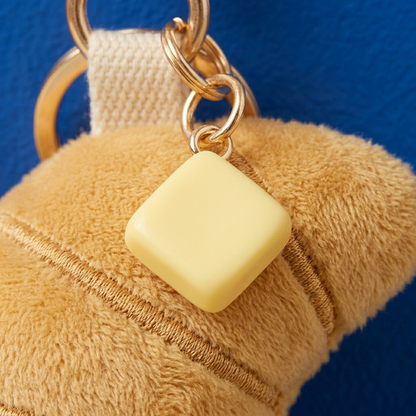 Butter square pendant gold rings and cream loop detail